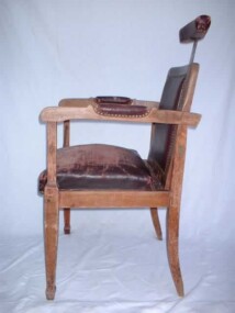 Fauteuil de barbier vu de trois quart
